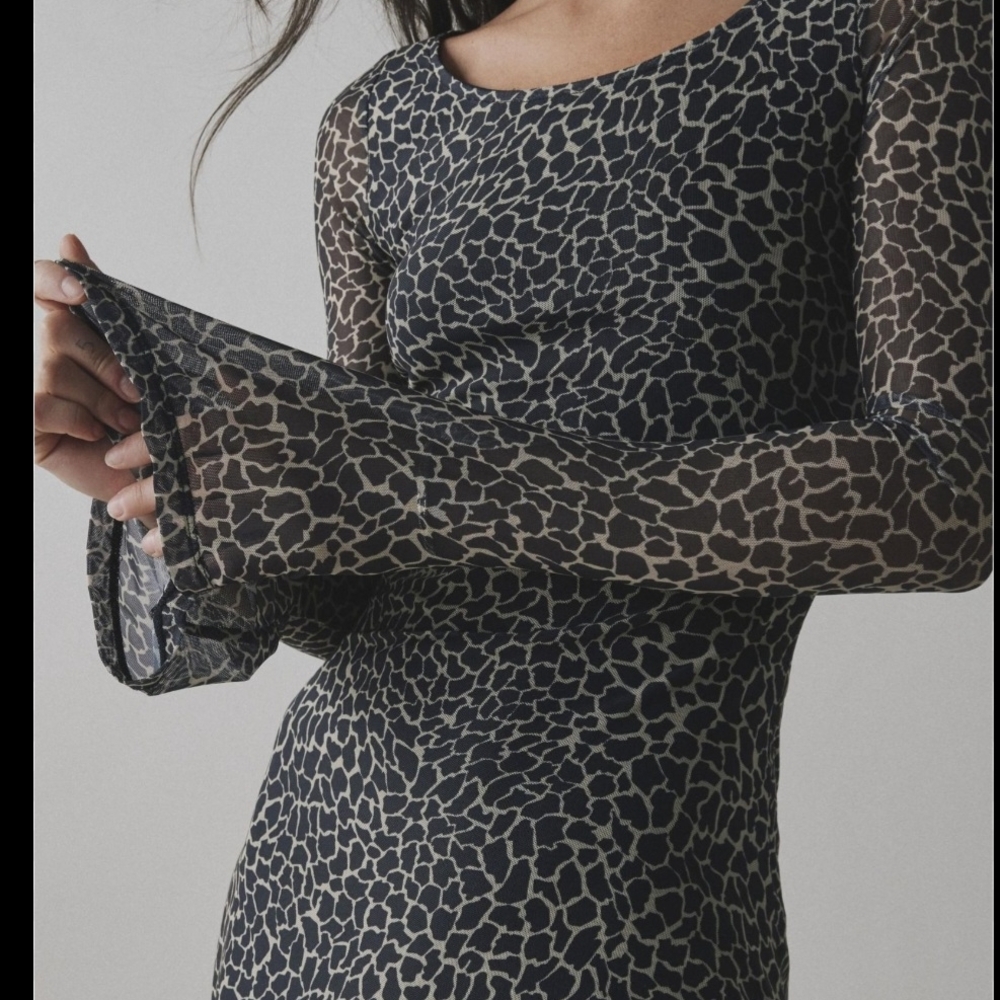Elegant Black and Cream Patterned Dress
